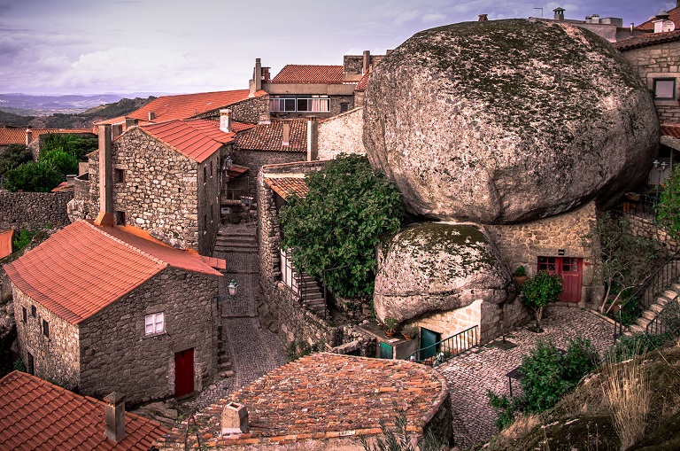 Tourists exploring the medieval Portugal neighborhoods