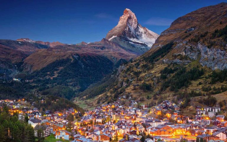 A picturesque view of a village at the foot of the foot of the Matterhorn Mountain