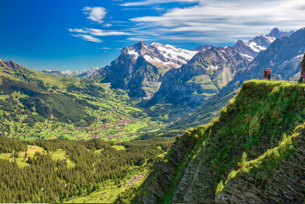 See landscape of alpine villages in the mountain range of Grindelwald, Europe