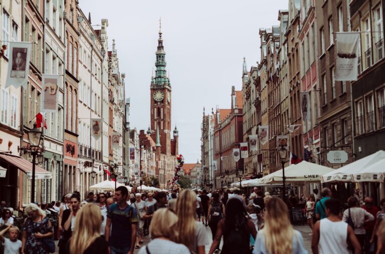 queue of people lining up at the street