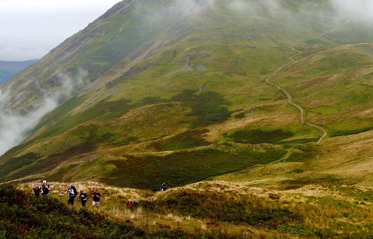 hiking along the mountainous region of the England Coast to Coast trail