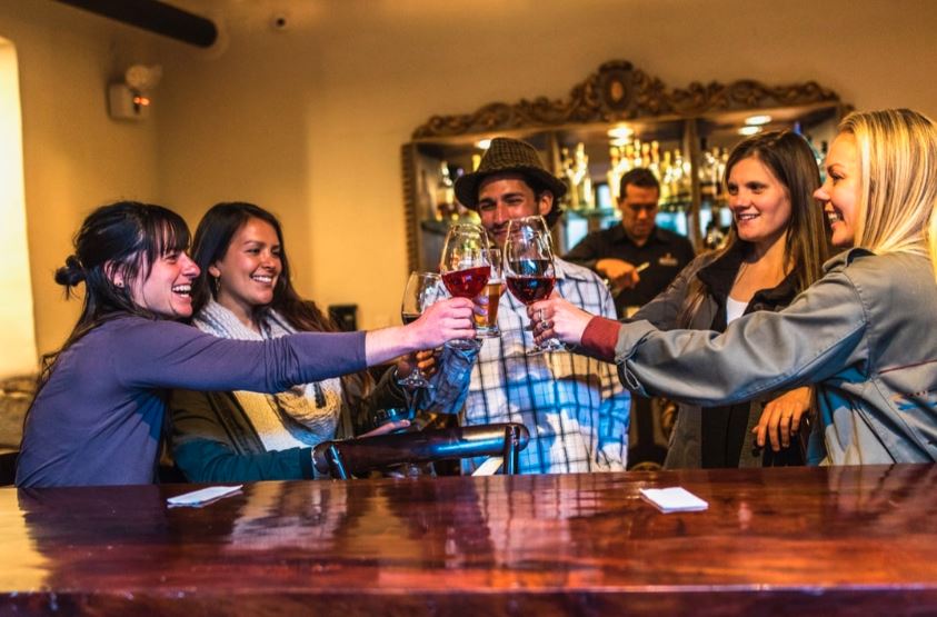 Toasting with friends at a winery Toasting with friends at a winery