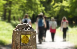 Hikers going on a pilgrimage trek in Portugal using the Camino de Santiago trail