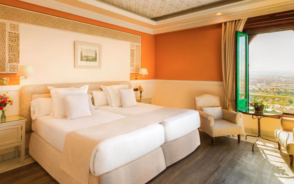 Tourists stay in a comfortable one night stay in Alhambra Palace - conveniently stacked with top-tier amenities