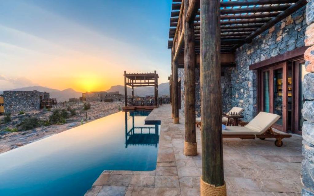 A outdoor pool that belongs to Alila Jabal Akhdor, a unique stay in Oman during a vacation