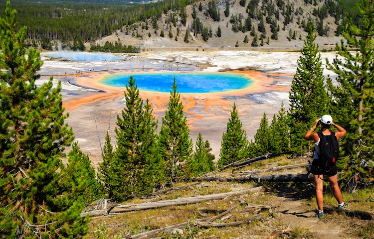 solo traveler exploring Yellowstone and Grand Teton's hot springs