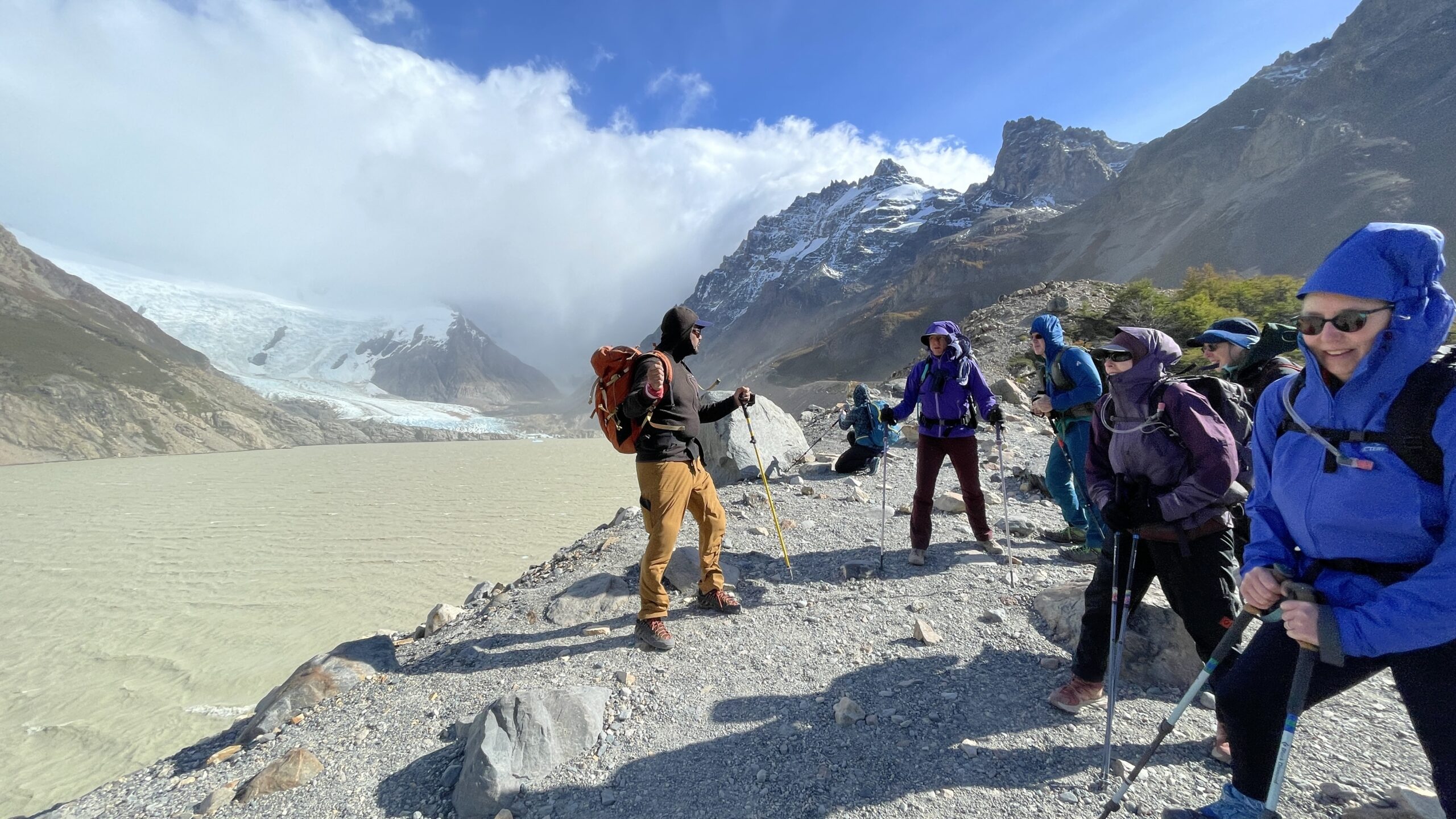 Patagonia Hikers journey near a glacier.