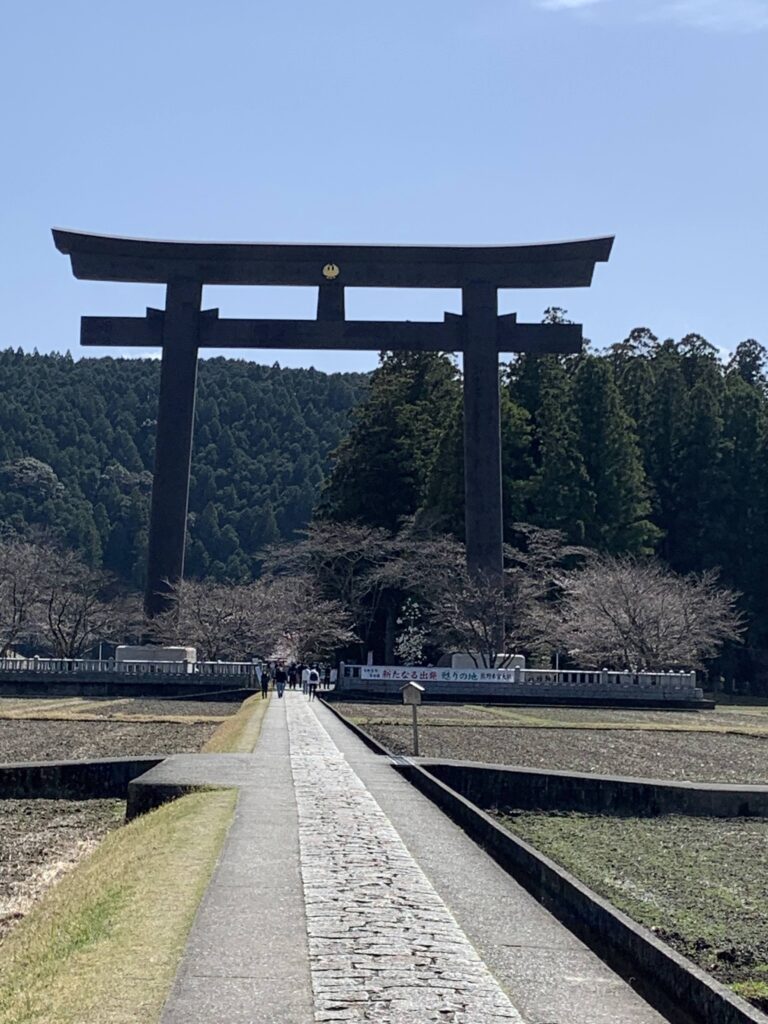 Travelers pausing to explore a popular landmark in Oyunohara, Japan