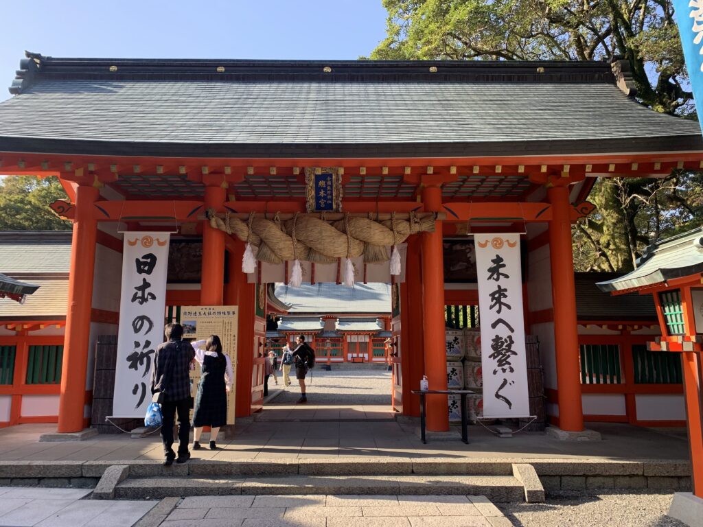Group of tourists exploring the popular tourist landmark the Hongu Taisha Temple along the Kumano Kodo Trail