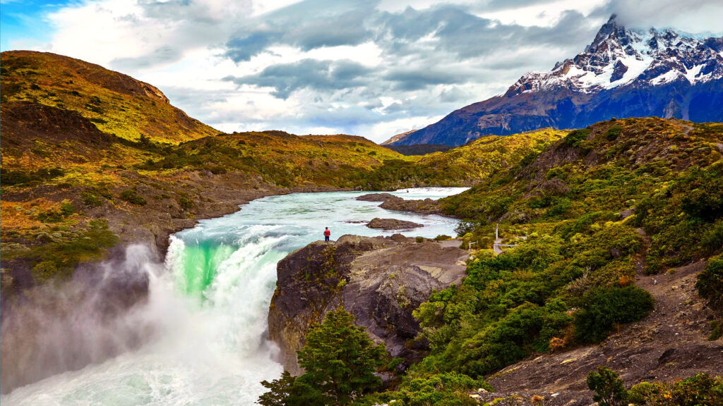 Solo traveler hiking a bucket-list climb in the wilderness of Patagonia 