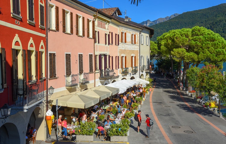 Tourists exploring Switzerland's most beautiful city, Lucerne during their Alps hiking adventure in Europe