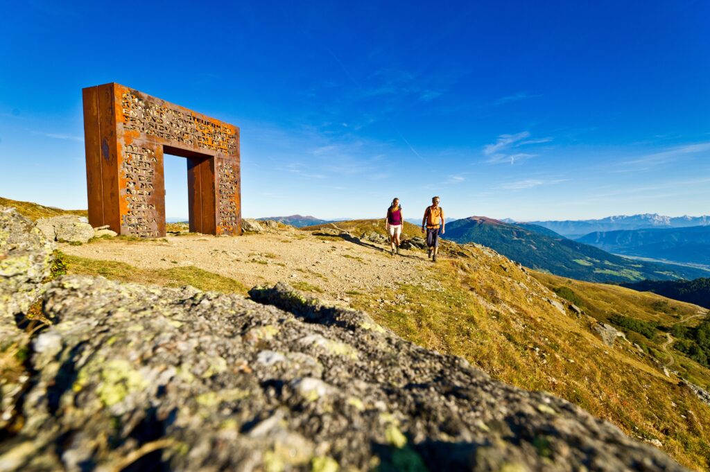 Hikers enjoying photo worthy views of Hohe Taurern National Park in Europe