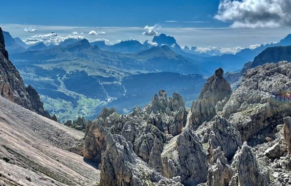 A view of the dolomites from the top of a mountain.