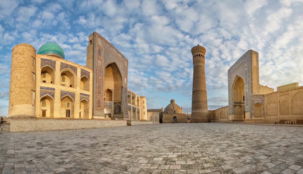 Panoramic view of Poi Kalan - an islamic religious complex located around the Kalan minaret in Bukhara, Uzbekistan