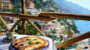 Pizza place terrace overlooking to a beautiful Positano coast, Italy