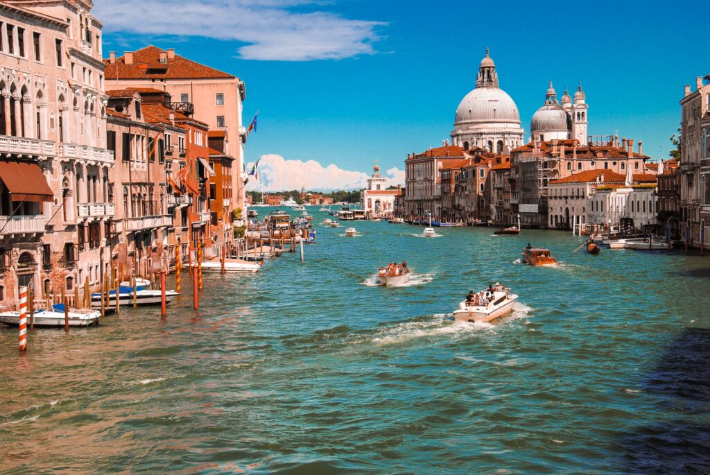 Taking a leisure boat ride through the picturesque city of Italy, Venice
