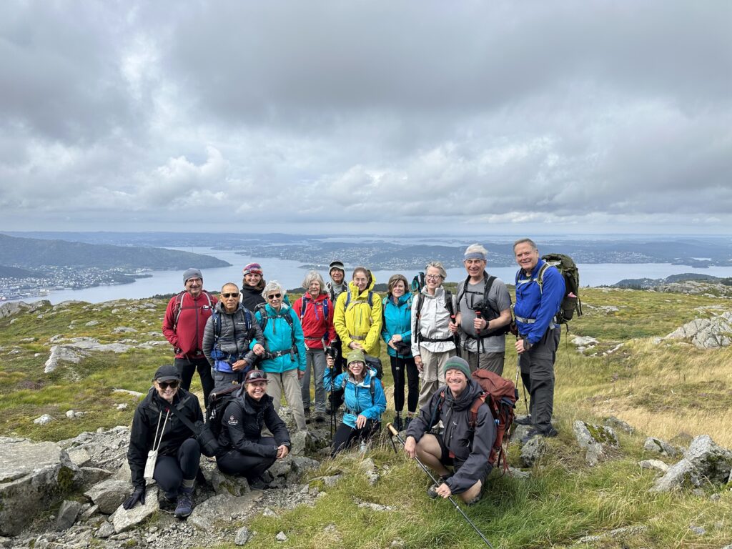happy group of hikers on a guided trek in Norway