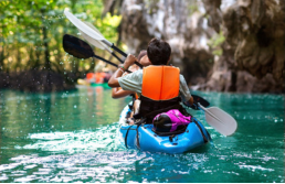 solo rafter on Pacuare river in Costa Rica's tropical jungle