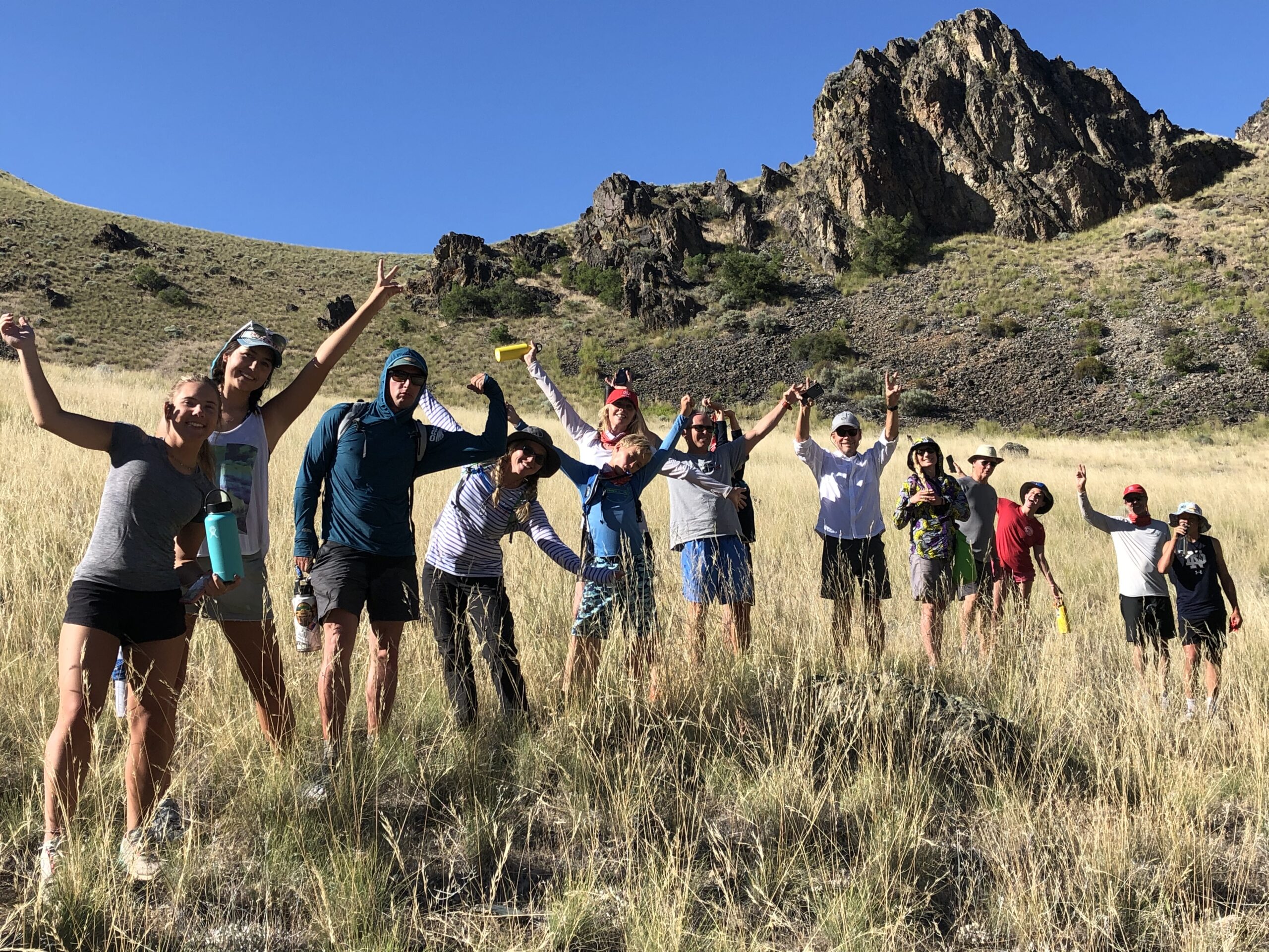 smiling group of travelers during a rafting adventure in Middle Fork of the Salmon River in Idaho, North America