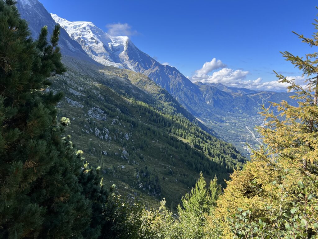 exploring sweeping mountain vistas on village to village hiking trail adventure in Switzerland and France in the Alps region in Europe