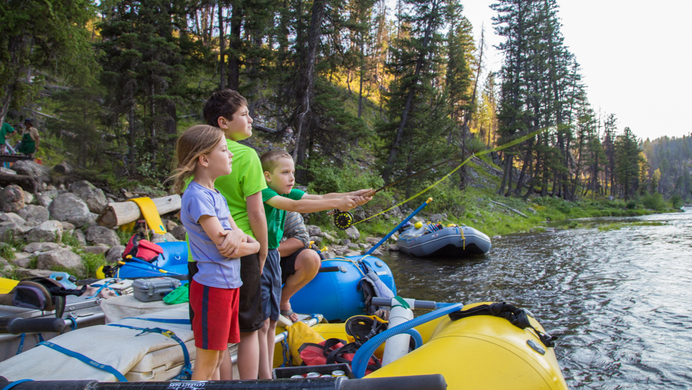 Children catch and release fly fishing on the Middle Fork of the Salmon River with MT Sobek