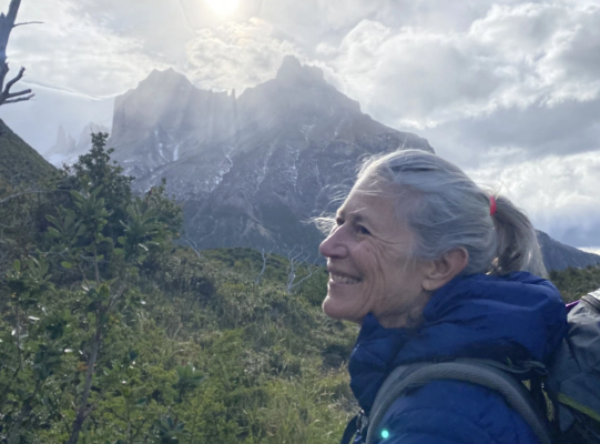 Diane gazing upward during a hike on a trail in Patagonia