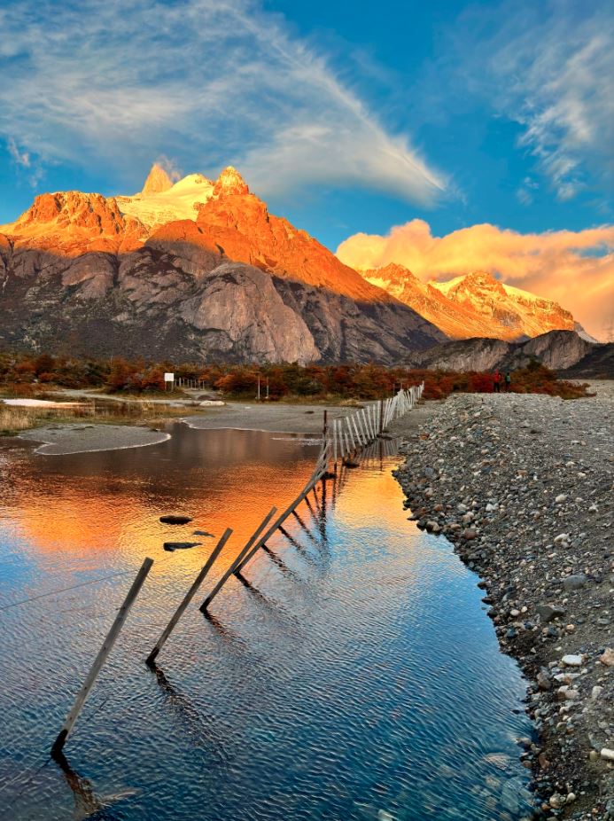 beautiful scenery shot of El Chalten in rosy sun glow in hiking trip in Argentina