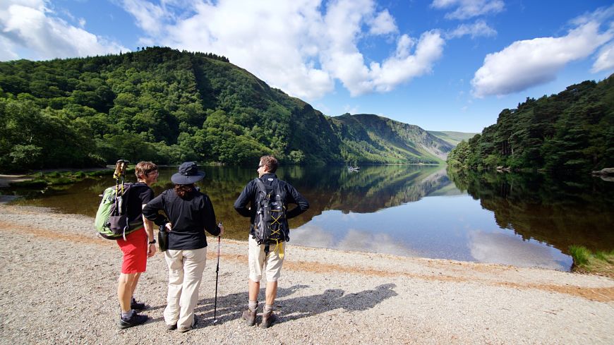 looking at upper Glendalough lake on hiking trip in ireland europe
