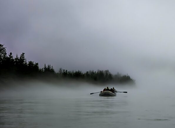 kayaking in mysterious fog in Alaska's Alsek River