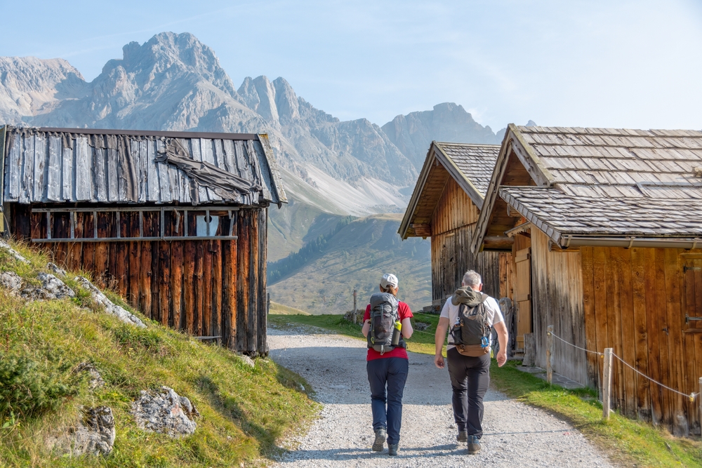 two solo hikers on trail to Italian Alps on a MT Sobek adventure