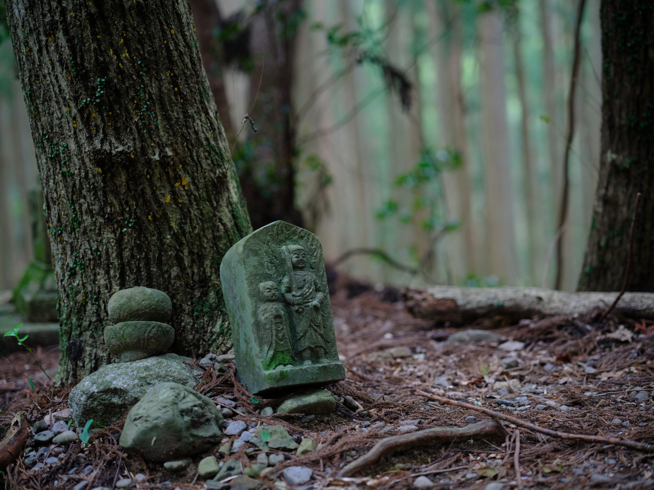 old stone statues in Kumano Kodo ancient trail in Japan