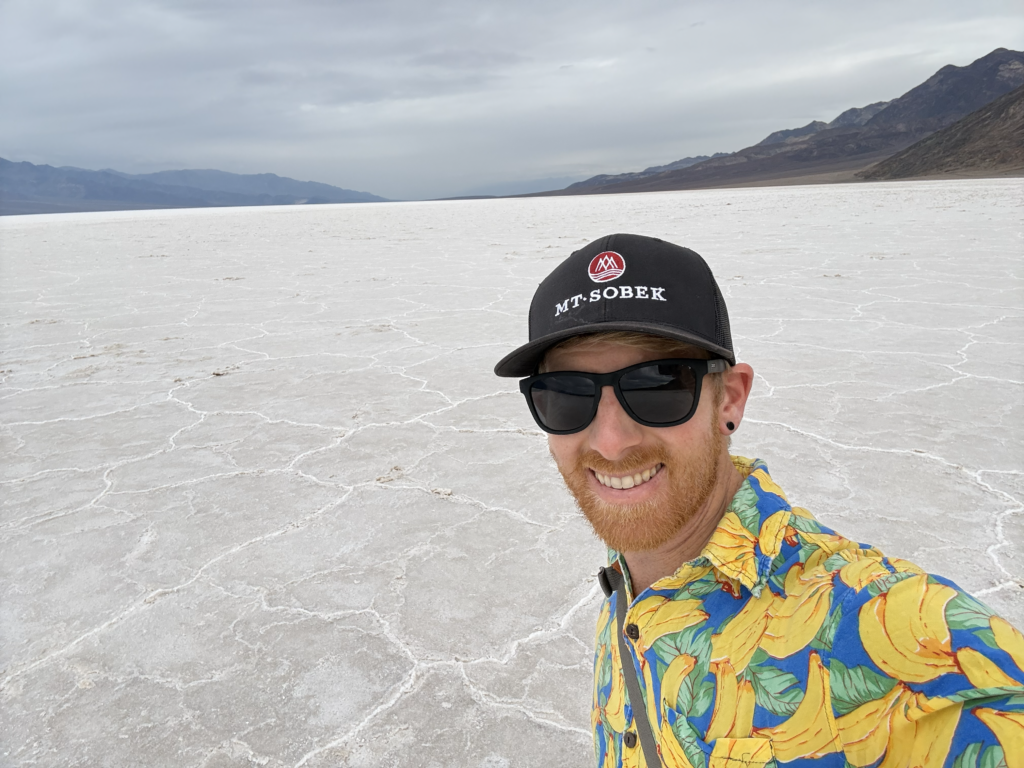 John enjoying his group hiking trip as a solo traveler at Death Valley National Park on a MT Sobek tour