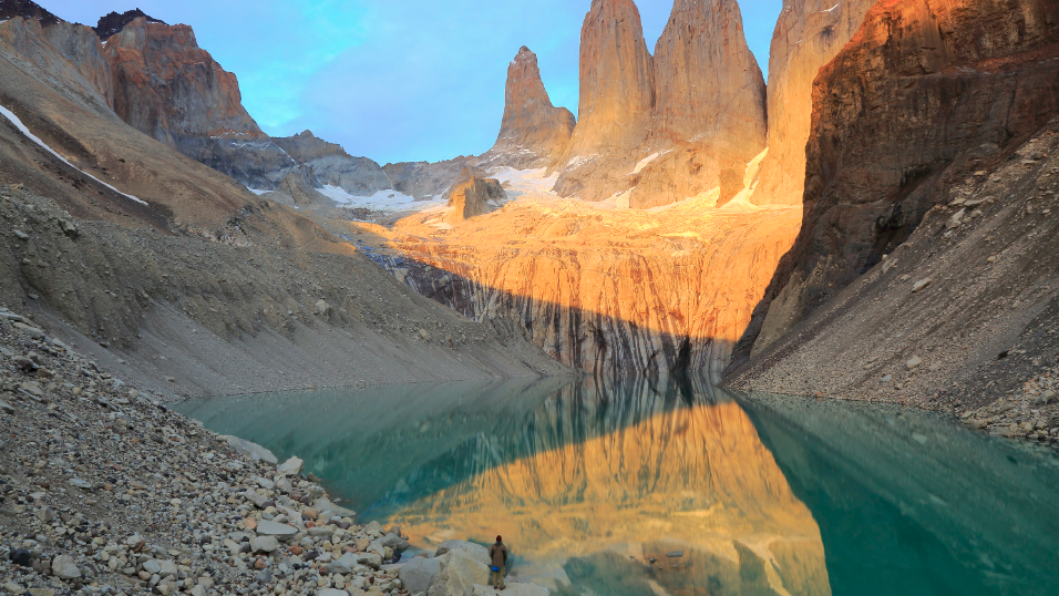 A breathtaking lake nestled amidst towering mountains, perfect for Patagonia active adventures.