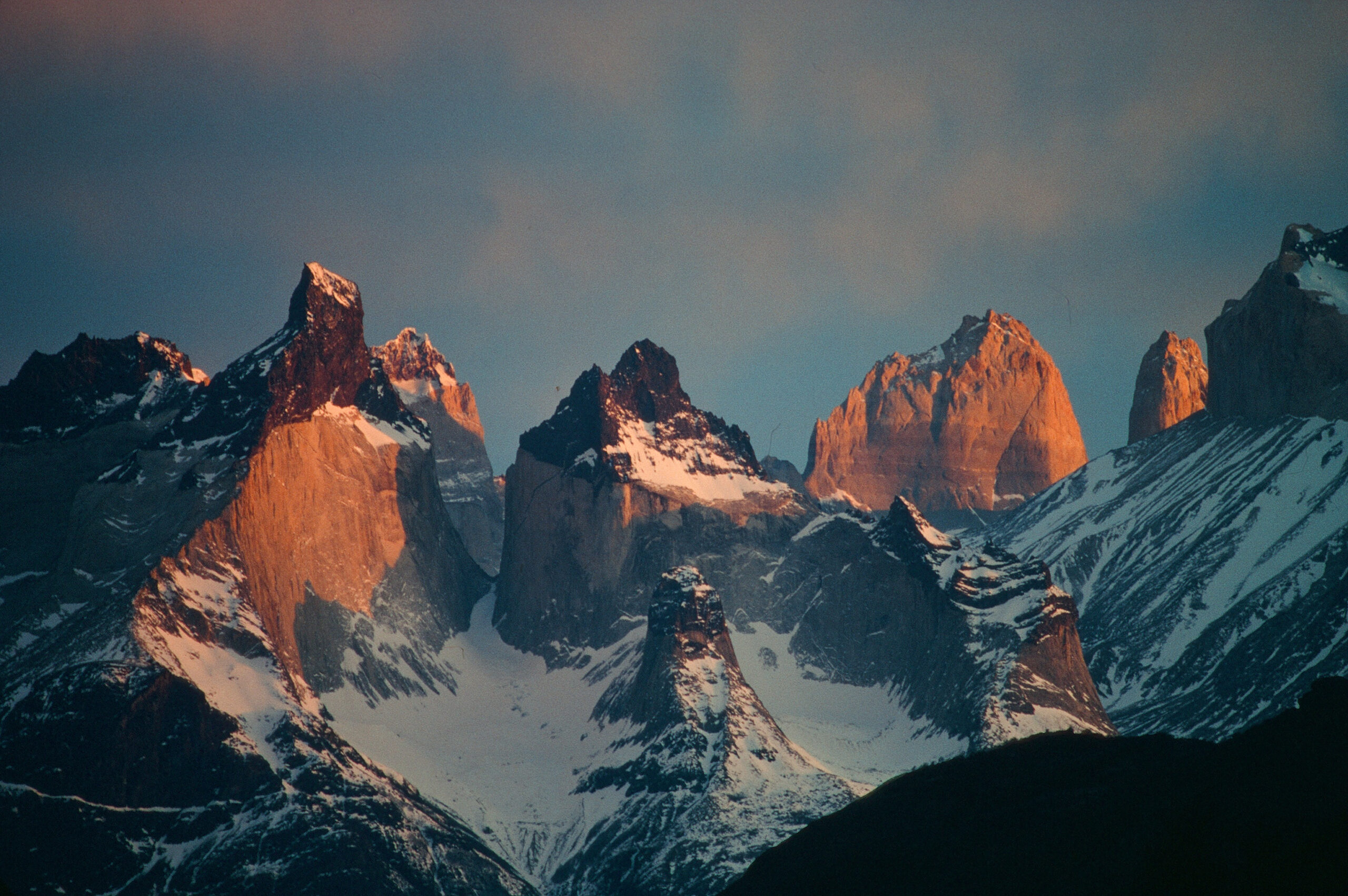 sunrise over towers of paine in chile in 1970s