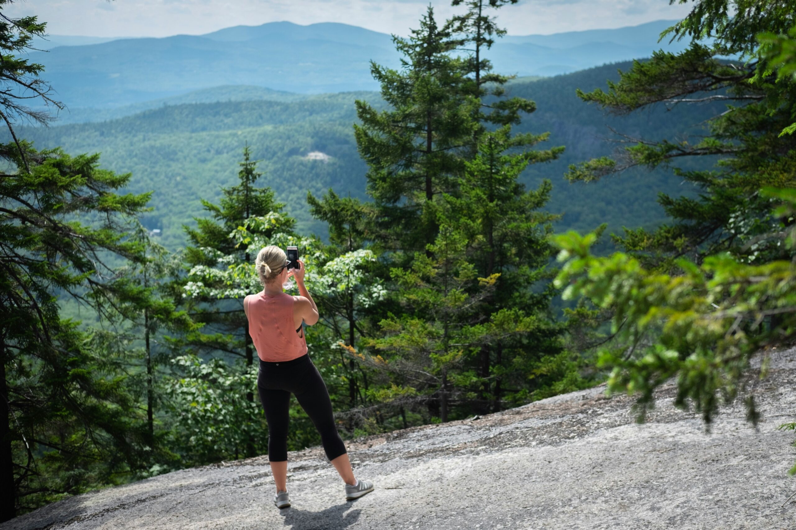 female hiker taking photography at white mountains trail